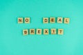 Words no deal brexit. The phrase is laid out in wooden letters. Top view. Motivation