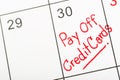 Words Pay off Credit Cards written on a Calendar Royalty Free Stock Photo