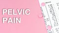 Words Pelvic Pain on pink background, medical concept, top view