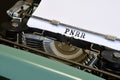 words \'PNRR\' typed on vintage typewriter.