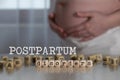 Words POSTPARTUM DISORDERS composed of wooden letters Royalty Free Stock Photo