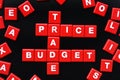 The words PRICE, BUDGET, TRADE and TAX spelled using letter