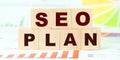 Words seo plan made with letters on wooden cubes on desk Royalty Free Stock Photo