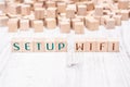 The Words Setup WIFI Formed By Wooden Blocks On A White Table Royalty Free Stock Photo