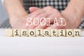 Words SOCIAL ISOLATION composed of wooden made dices Royalty Free Stock Photo