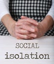 Words SOCIAL ISOLATION. Senior woman in the background Royalty Free Stock Photo