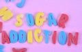 The words Sugar Addiction on table