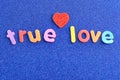 The words true love in colorful letters