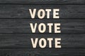 Words Vote by wooden letters