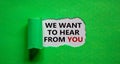 The words `we want to hear from you` appearing behind torn green paper. Beautiful background. Business concept