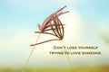 Love inspirational motivational words - Do not lose yourself trying to love someone. With grass flowers on blue sky background