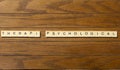 Words written on blocks on wood table Royalty Free Stock Photo