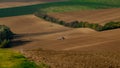 Work with an agricultural tractor in Moravian fields