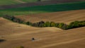 Work with an agricultural tractor in Moravian fields