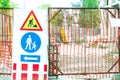Work ahead street reconstruction site with sign and fence as road barricade Royalty Free Stock Photo