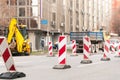 Work ahead street reconstruction site with sign and fence as road barricade Royalty Free Stock Photo