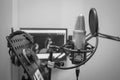 The work of the announcer and actor of voice acting and dubbing in front of the microphone Royalty Free Stock Photo