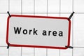Work area sign on a fence Royalty Free Stock Photo