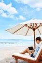 Work At Beach. Business Woman Working Online On Laptop Outdoors Royalty Free Stock Photo