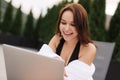 Work At Beach. Successful Business Woman Working Online In Internet Using Laptop Computer Outdoors. Girl Typing On Keyboard While Royalty Free Stock Photo