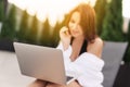 Work At Beach. Successful Business Woman Working Online In Internet Using Laptop Computer Outdoors. Girl Typing On Keyboard While Royalty Free Stock Photo