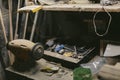 Work bench with an electric emery night Royalty Free Stock Photo