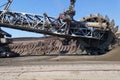 work of a bucket wheel excavator in a quarry. Ore mining in a quarry