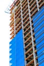 Work on the construction of a high-rise building. construction of an apartment building, office building Royalty Free Stock Photo