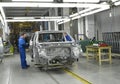 Work on the conveyor line of automobile plant