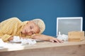 Work, covid and woman at desk sleeping with tissue paper and laptop, tired and overworked from flu or cold. Sick Royalty Free Stock Photo