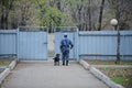 Almaty, Kazakhstan - 11.04.2014 : A dog handler prepares for training with a service dog