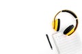Work desk of modern composer. Music notes near headphones on white background top view copy space Royalty Free Stock Photo