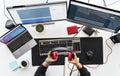 Work desk with multiple screens and electronic devices. Royalty Free Stock Photo