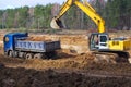 Work of digging ground and machines truck Royalty Free Stock Photo