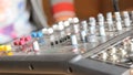 Work on a DJ console, a mixing console