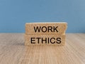 Work ethics symbol. Concept words Work ethics on brick blocks. Beautiful blue background Royalty Free Stock Photo