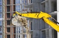 Excavating machine on construction site Royalty Free Stock Photo