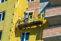 Work on the external walls of glass wool insulation and plaster Royalty Free Stock Photo