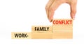 Work-family conflict symbol. Concept words Work-family conflict on wooden block on a beautiful white table white background. Royalty Free Stock Photo