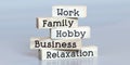 Work, family, hobby, business, relaxation - words on wooden blocks