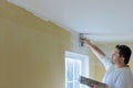 Work hand tool wall using plastering tool for finishing wall