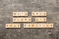 Work hard dream big stay positive word written on wood block. Work hard dream big stay positive text on cement table for Royalty Free Stock Photo