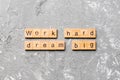 Work hard dream big word written on wood block. Work hard dream big text on cement table for your desing, Top view concept Royalty Free Stock Photo