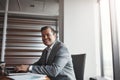 Work hard, and success will follow. Cropped portrait of a handsome businessman working in his corporate office.