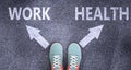 Work and health as different choices in life - pictured as words Work, health on a road to symbolize making decision and picking