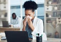 Work, healthcare and black woman at desk blowing nose with tissue paper from flu, cold or hay fever. Sick, exhausted Royalty Free Stock Photo