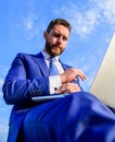 Work is his lifestyle. Man with laptop surfing internet bottom view. Entrepreneur find opportunity to work wherever he Royalty Free Stock Photo