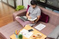 Work from home,Businessman working remotely from home. Using computer. Distance learning online education and work Royalty Free Stock Photo
