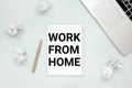 Work from home concept . Laptop, notepad, crumpled paper Royalty Free Stock Photo