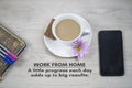 Work from home concept. Motivational text message on white table background - A little progress each day adds up to big results.